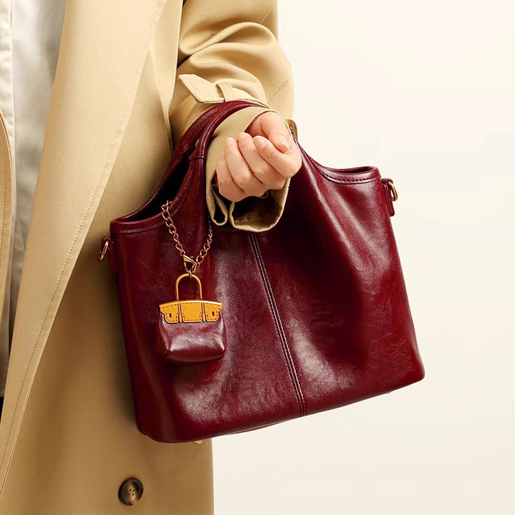 QARELA Red Glossy Leather Tote Bag – Elegant Large-Capacity Shoulder & Handbag for Work or Occasions Radiate confidence and charm with this bold red tote — a statement of modern elegance for workdays or special events.